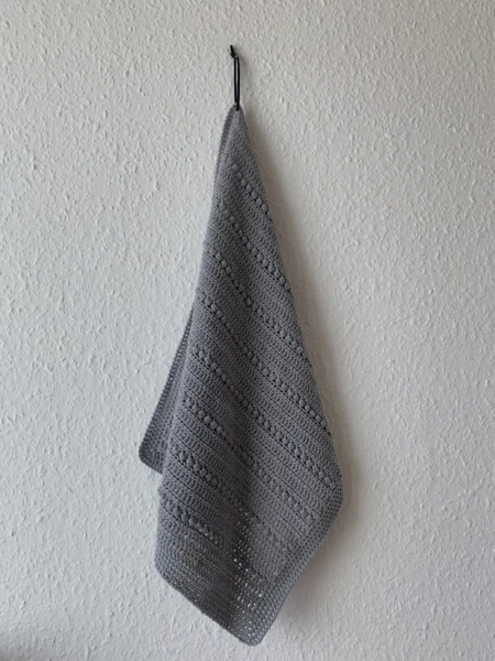 Hæklet håndklæde med perlemasker