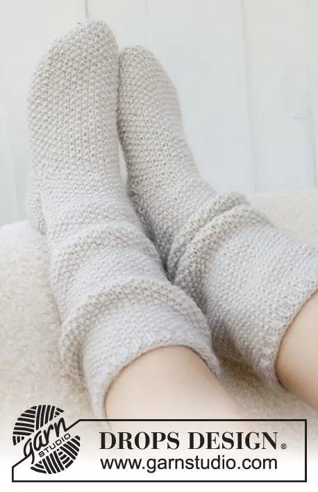 234-73 Snow White Socks by DROPS Design