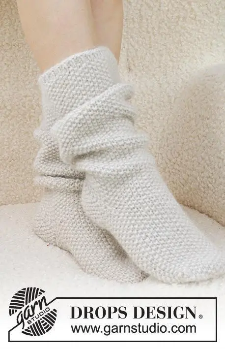 234-73 Snow White Socks by DROPS Design