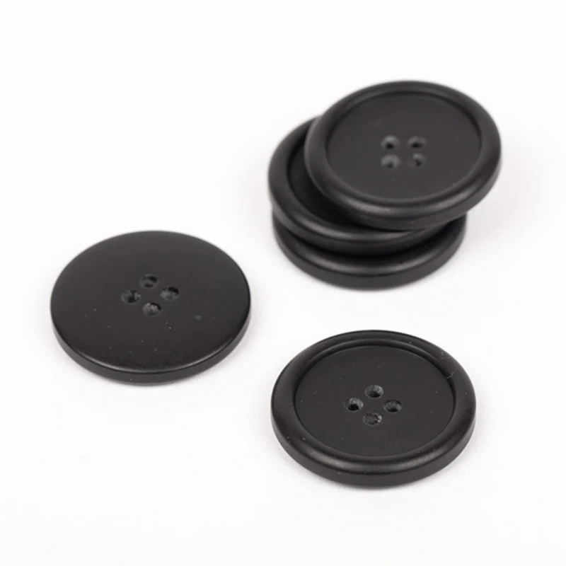 DROPS Matte Black, Knap, 23 mm (nr. 815)