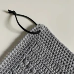 Hæklet håndklæde med perlemasker